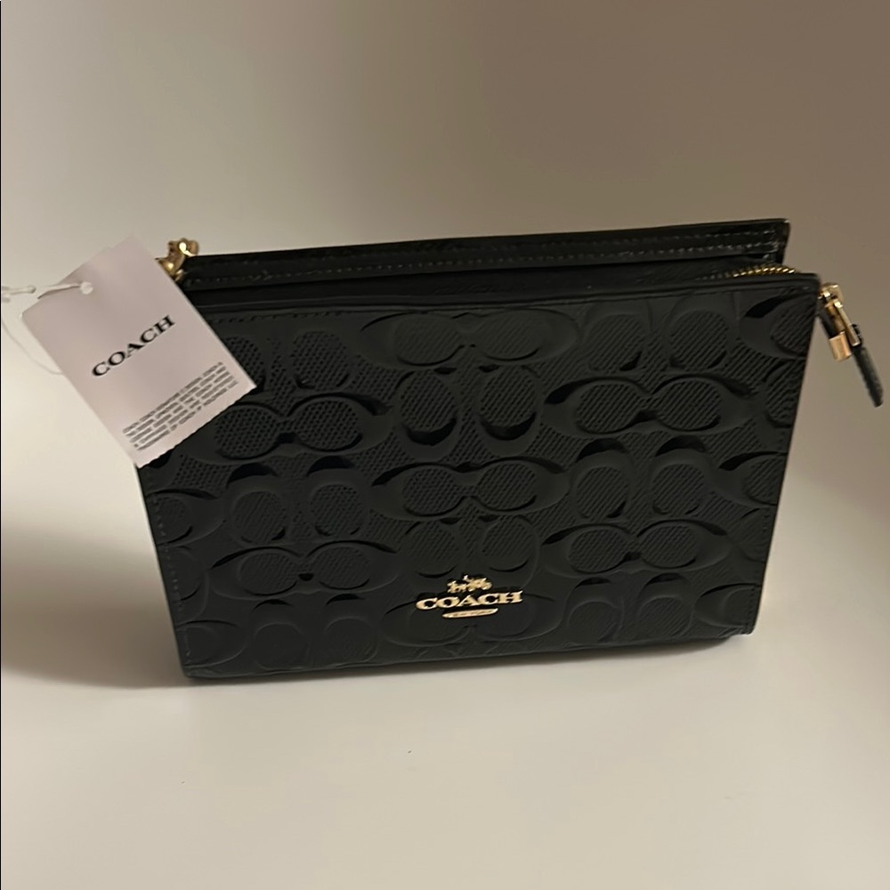Coach Gold and Black Embossed Clutch with Gold Hardware